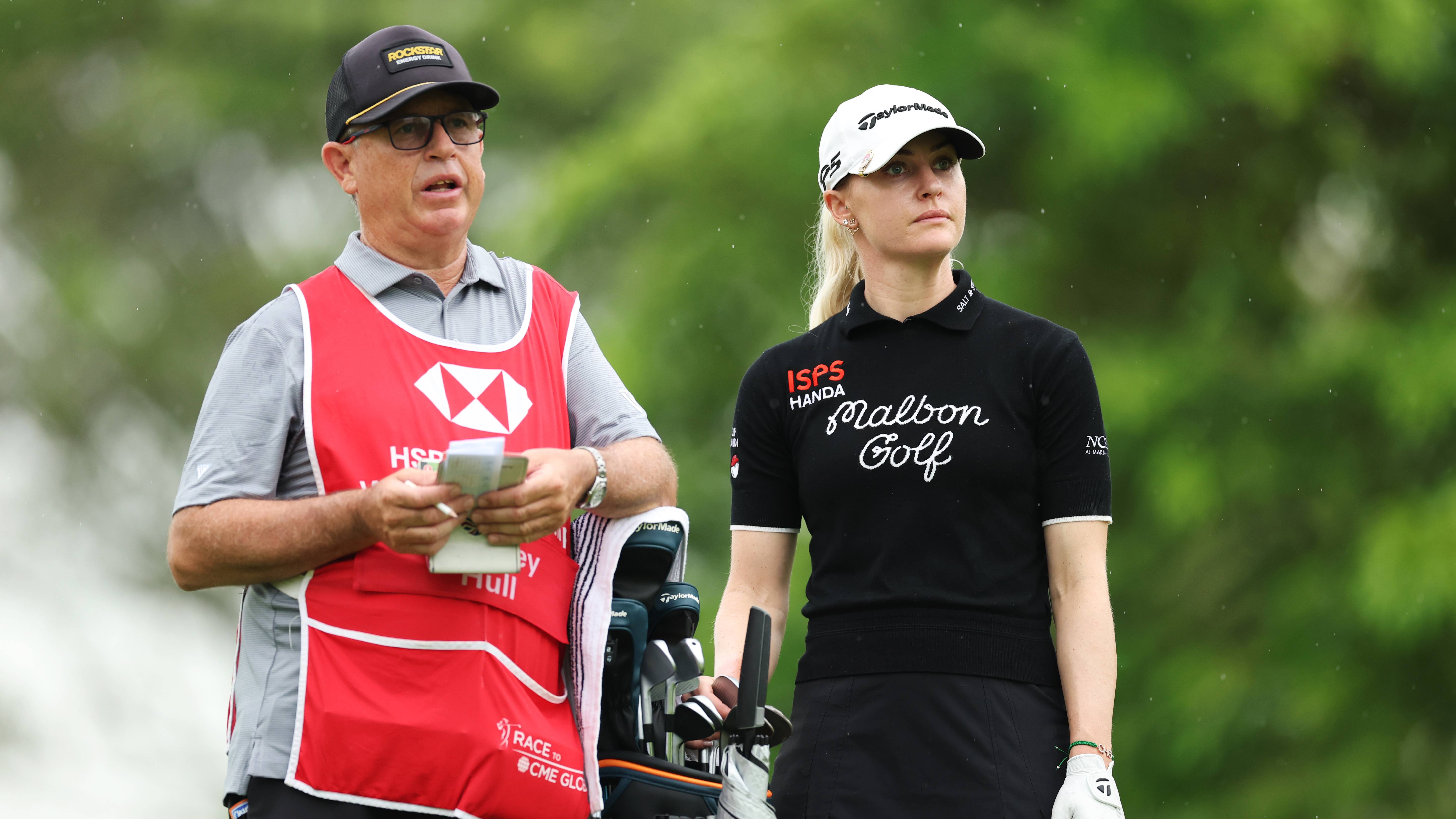 Charley Hull and her caddie Adam Woodward