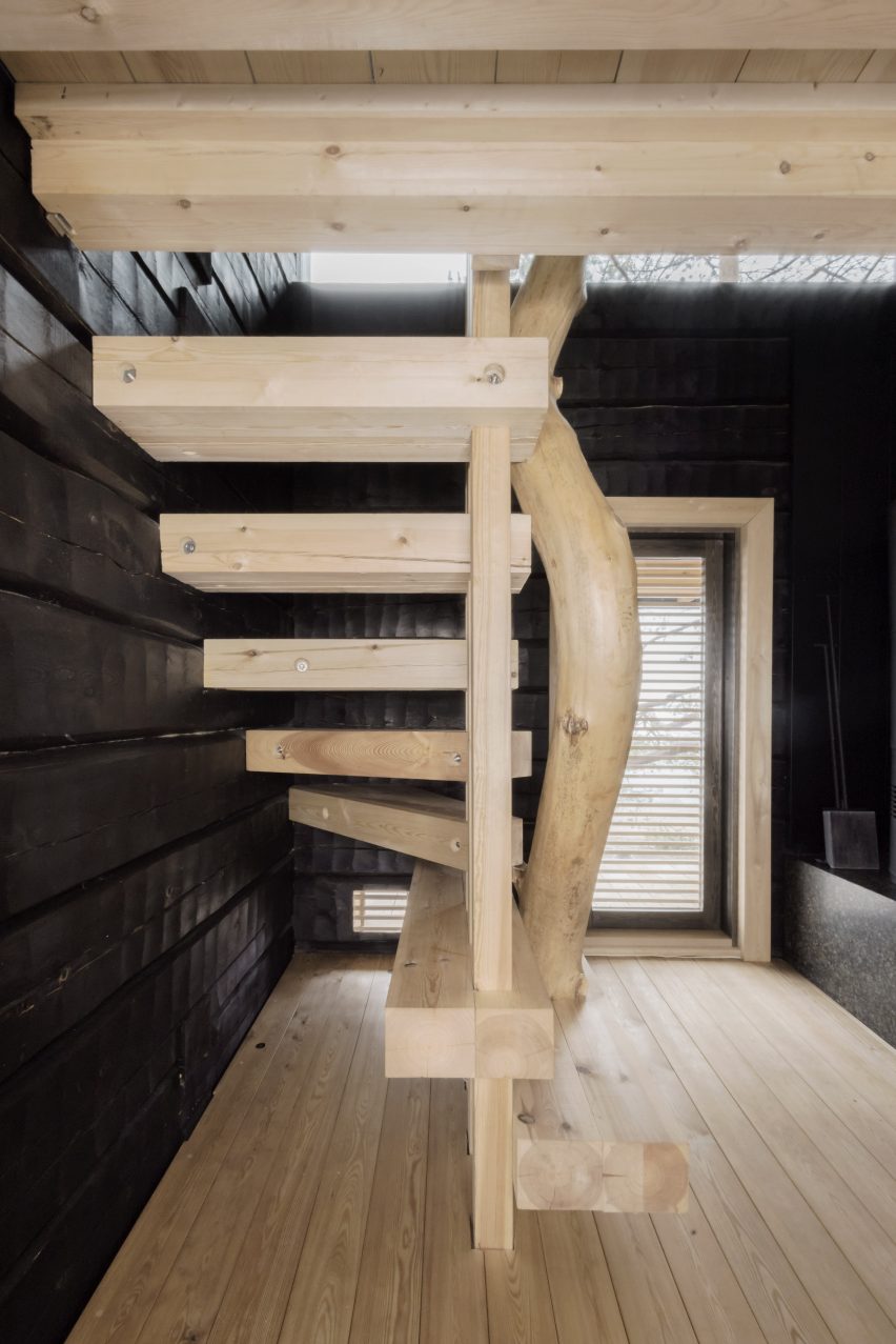Staircase with tree-trunk bannister