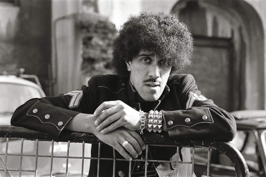 Phil Lynott leaning on a railing