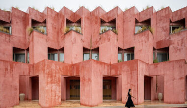 stucco surfaces form layered facade for hotel by RA! in mexico