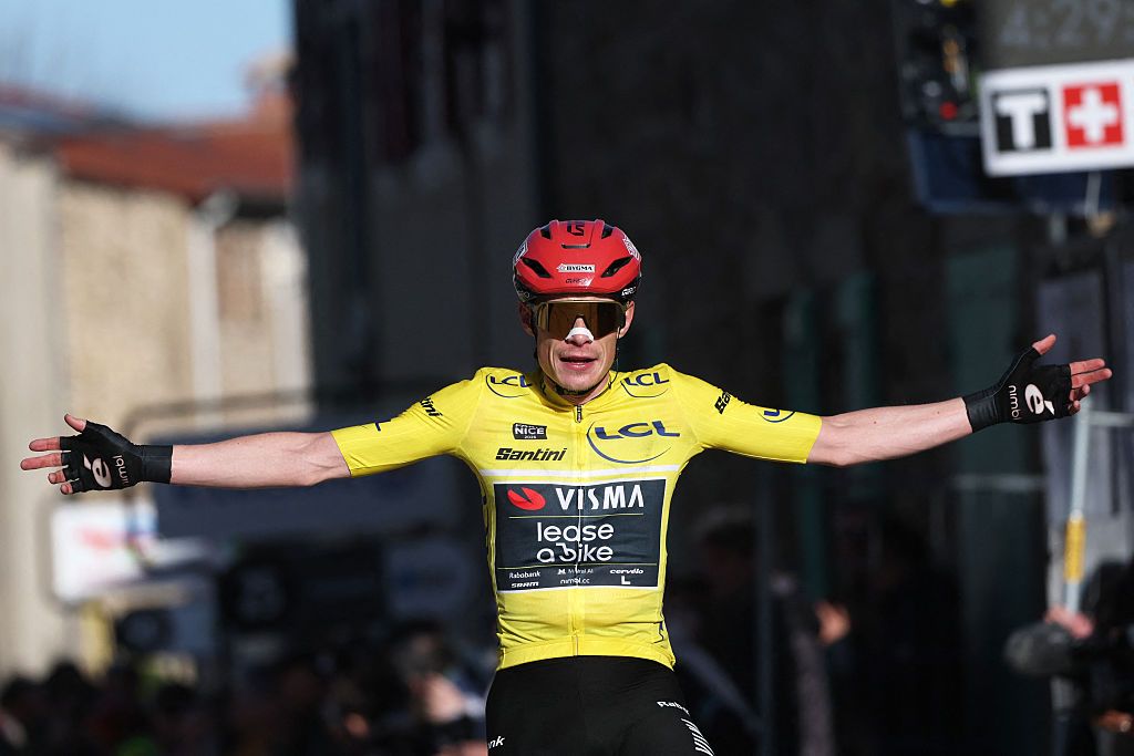 Team Visma - Lease a Bike's Danish rider Jonas Vingegaard celebrates as he crosses crossing the finish to win the 5th stage of the Paris-Nice cycling race, 206.3 km between Cormoranche-sur-Sa&amp;ocirc;ne and Colombier-le-Vieux, on March 12, 2026. (Photo by Anne-Christine POUJOULAT / AFP)