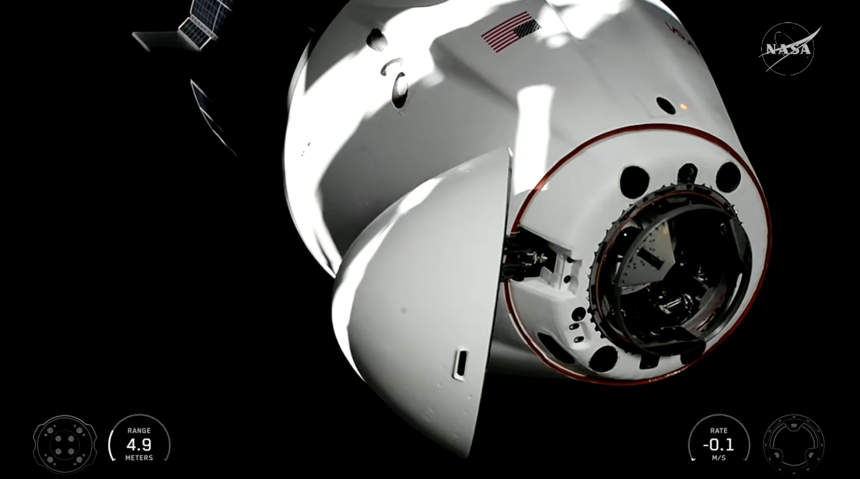 In this screengrab from NASA's youtube channel, Crew-12’s SpaceX Dragon docks at the International Space Station on Saturday, February 14, 2026.