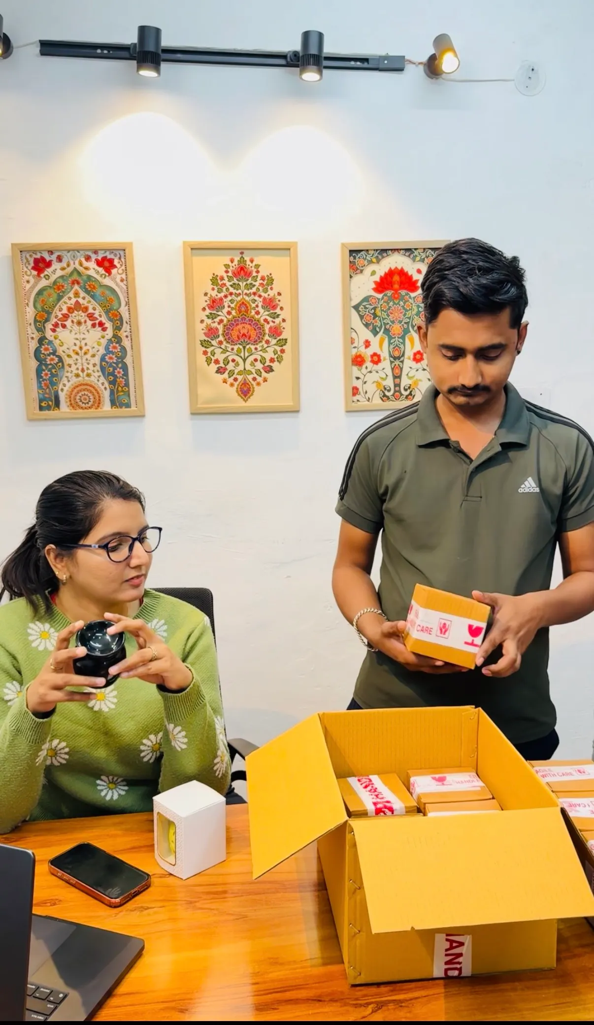 Shruti is giving instructions to her warehouse staff, Rahul