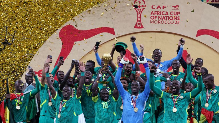 Senegal's Sadio Mane lifts the trophy with teammates as they celebrate after winning the Africa Cup of Nations. Pic: Reuters