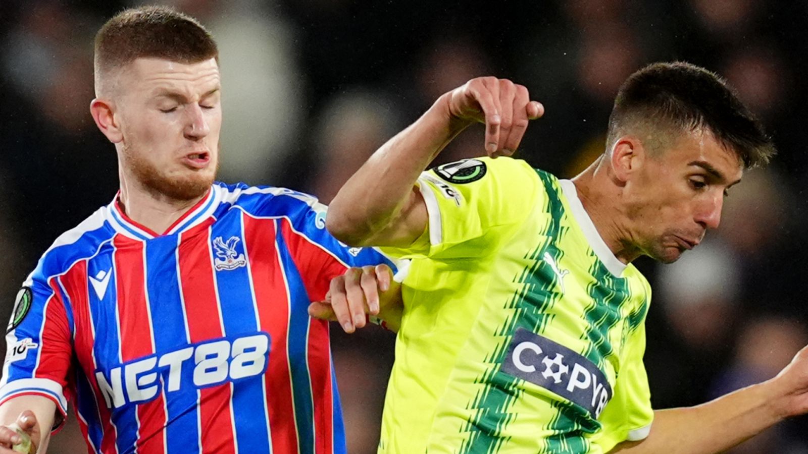 Adam Wharton (left) battles for the ball during Crystal Palace's 0-0 draw with AEK Larnaca