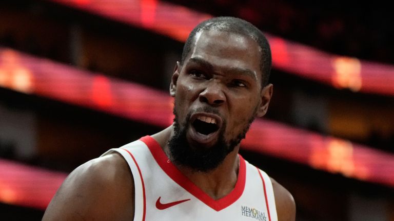 Houston Rockets forward Kevin Durant (7) reacts after shooting a 3-pointer during the second half of an NBA basketball game against the Miami Heat in Houston, Saturday, March 21, 2026. (AP Photo/Ashley Landis)