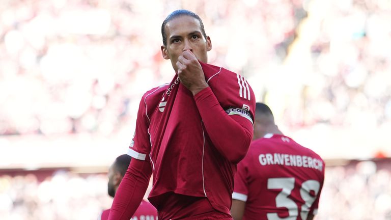 Liverpool's Virgil van Dijk celebrates after scoring (AP Photo/Jon Super)