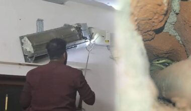 1) Gautham during the rescue, 2) A snake found inside the hole. Photos: Special Arrangement.