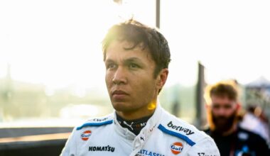 A race car driver in his suit.