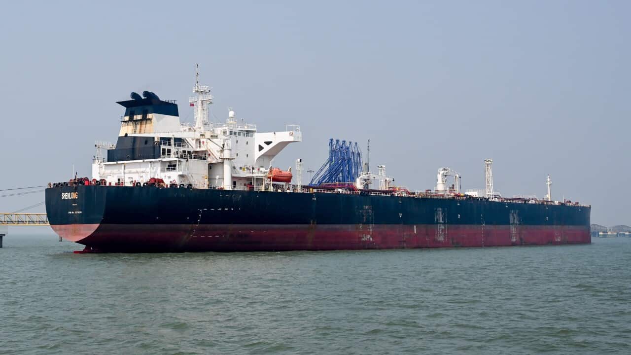 A large oil tanker in the sea.