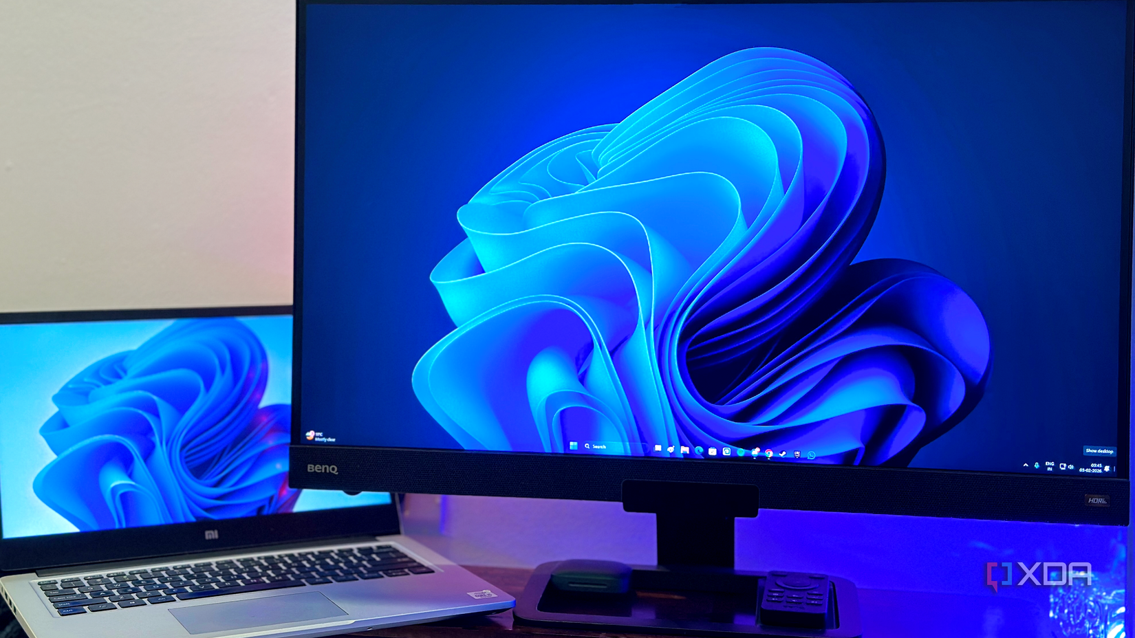 Windows 11 desktop and laptop.