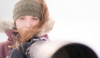 Lara Jackson-Turner, holding a Nikon camera on a Nikon shoot in Norway, taken by Nikon Creator Rachel Bigsby