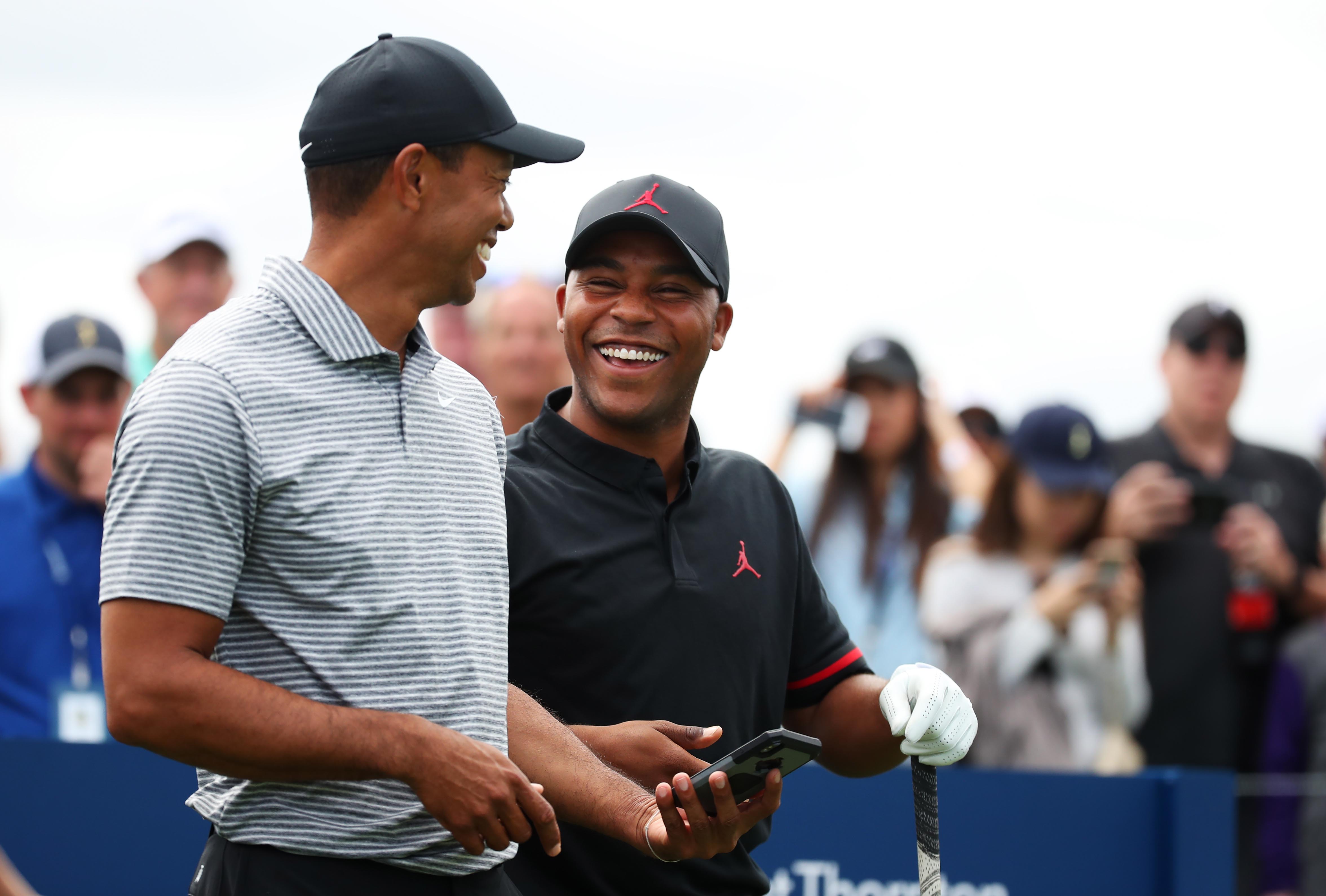 Tiger Woods and Harold Varner laugh during the 2019 Players Championship at TPC Sawgrass