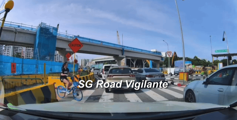 woman cycling zebra crossing