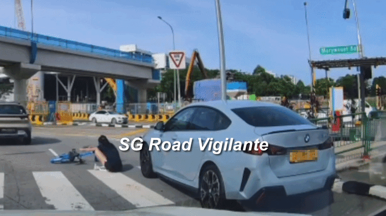 woman cycling zebra crossing
