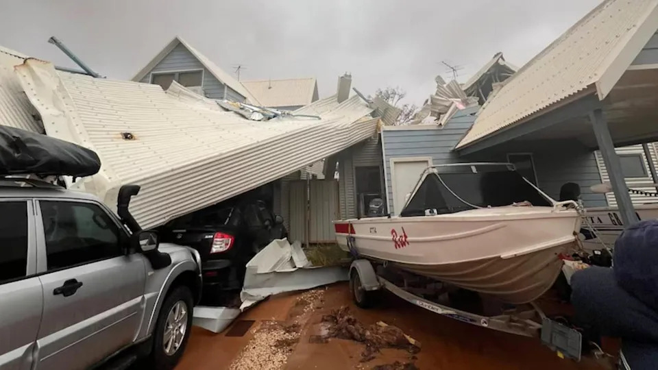 Roof panels been ripped off a house in Exmouth by Tropical Cyclone Narelle. Picture: 7News