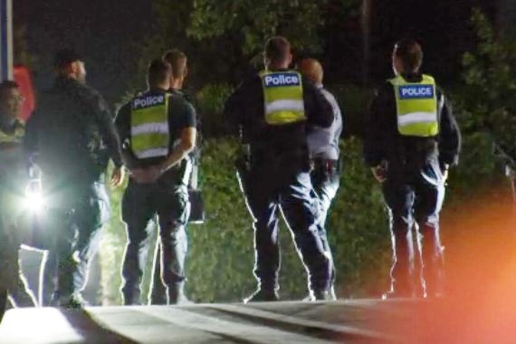 Several police officers.