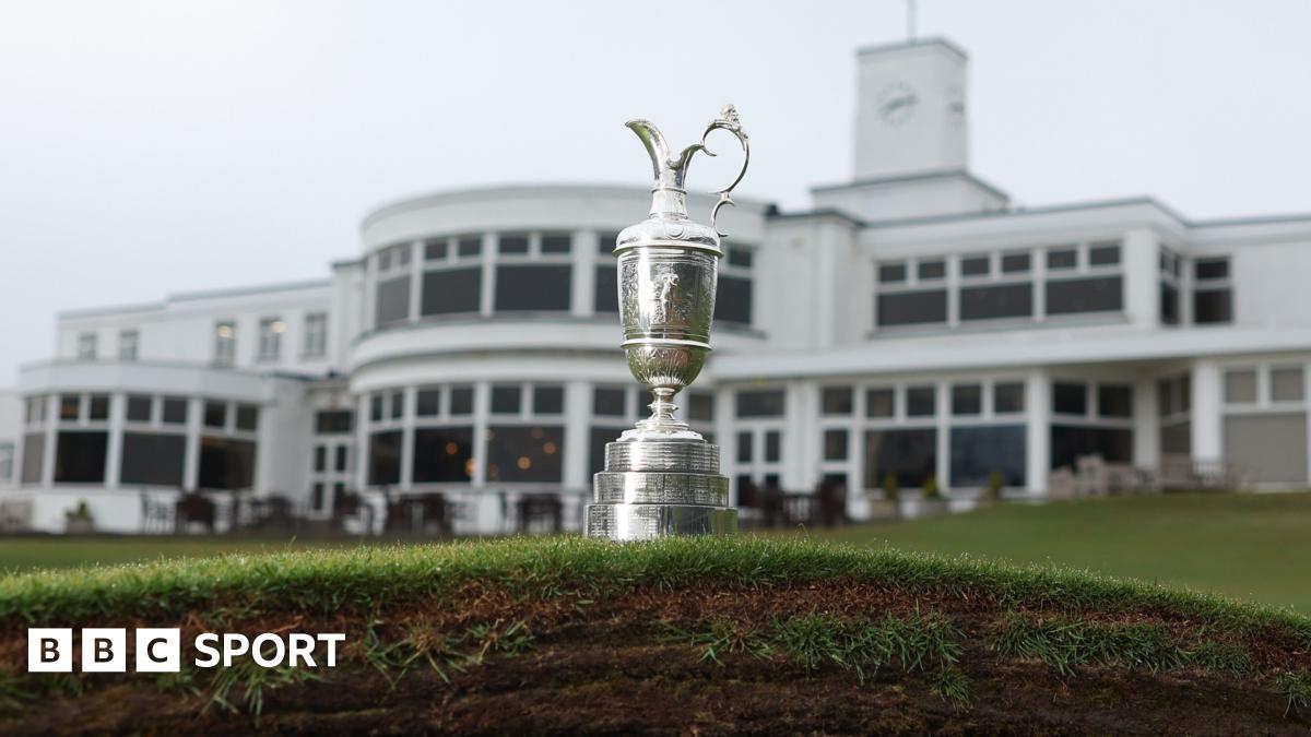 The Claret Jug photographed on top of a bunker in front of the Royal Birkdale clubhouse