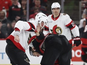 Brady Tkachuk and Jordan Staal fight