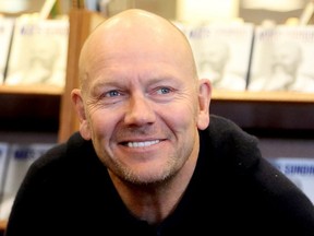 Mats Sundin smiles during a book signing
