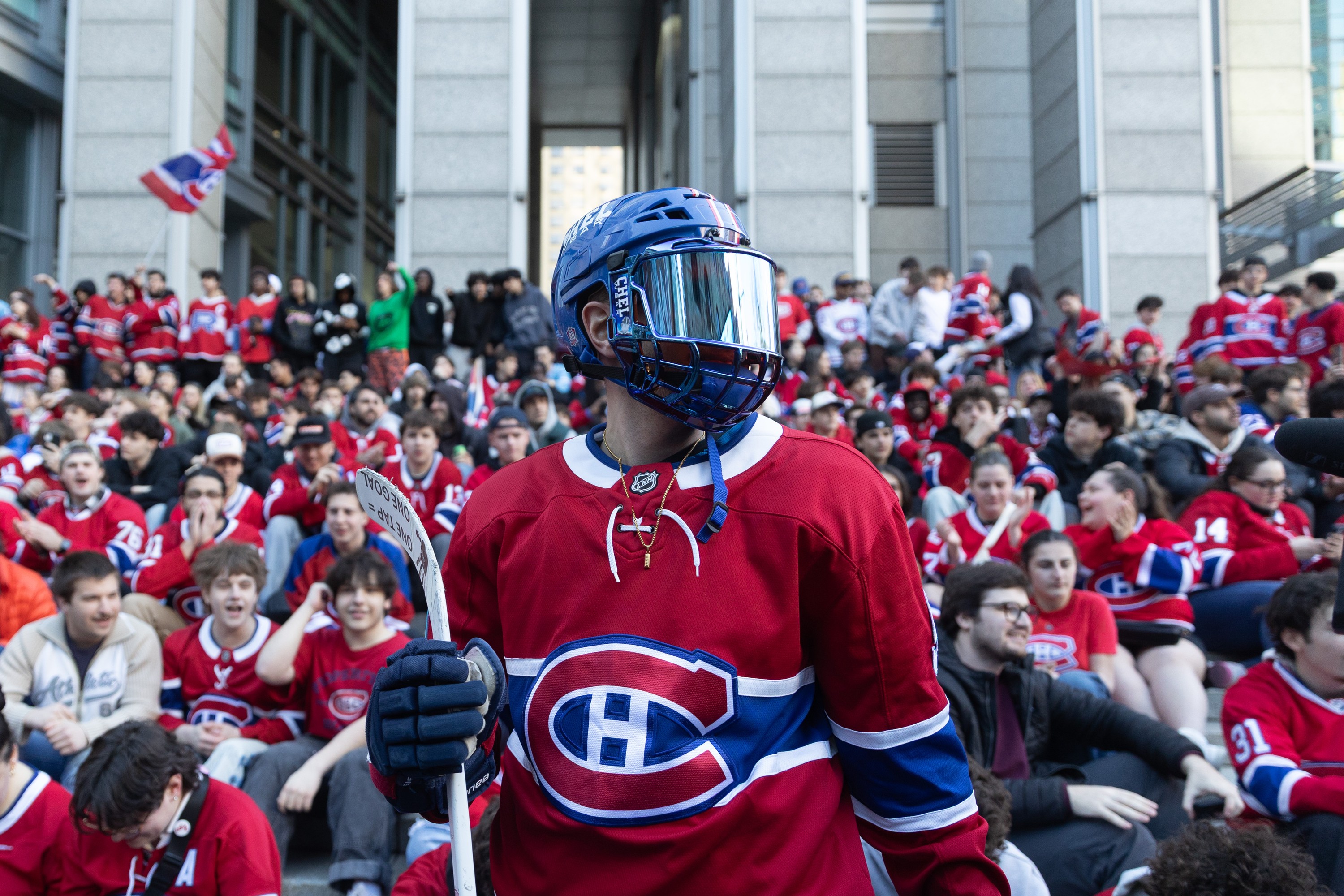 Habs fans in jerseys and hockey gear