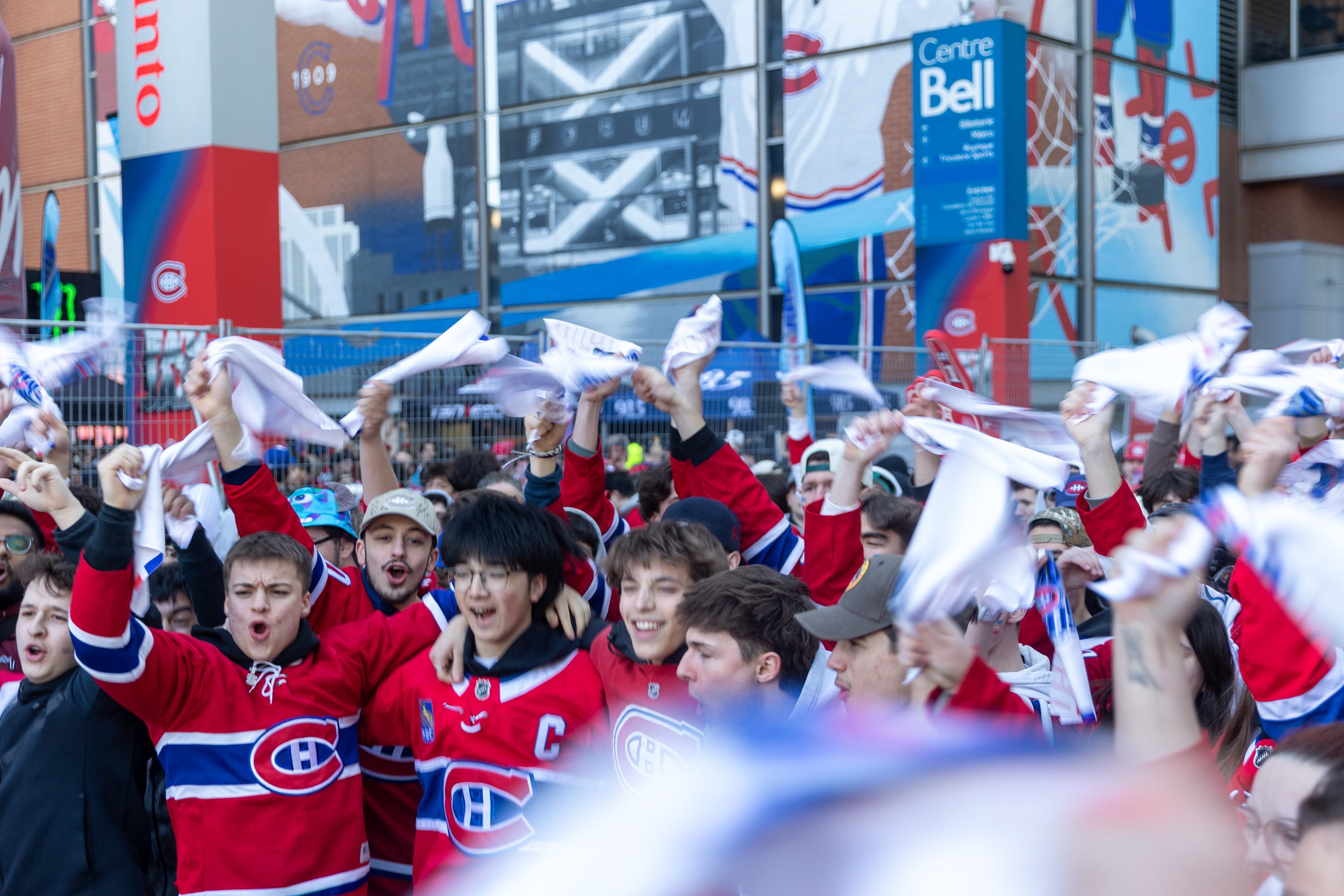 fans in Habs jerseys waving towels