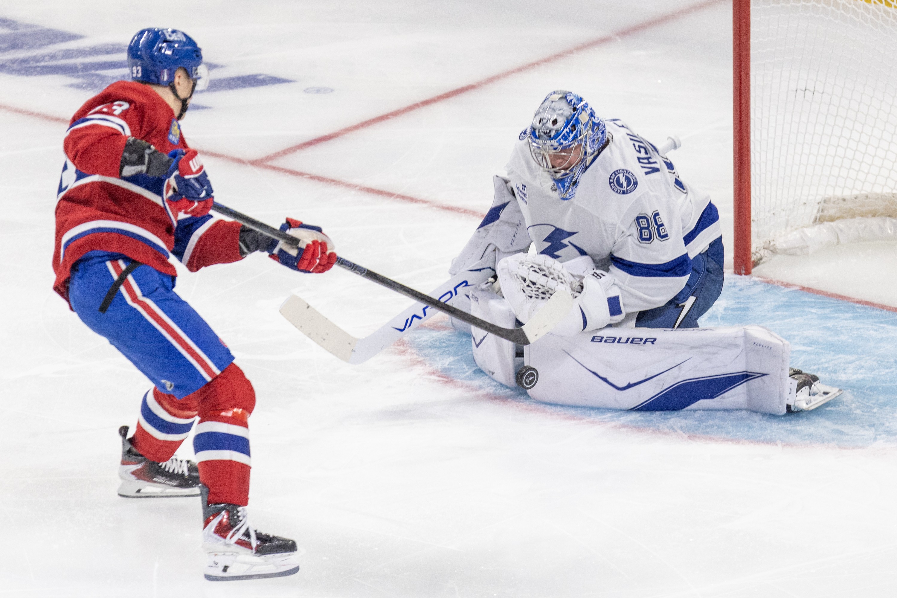 Lightning goalie Andrei Vasilevskiy stops Canadiens' Ivan Demidov's breakaway shot.