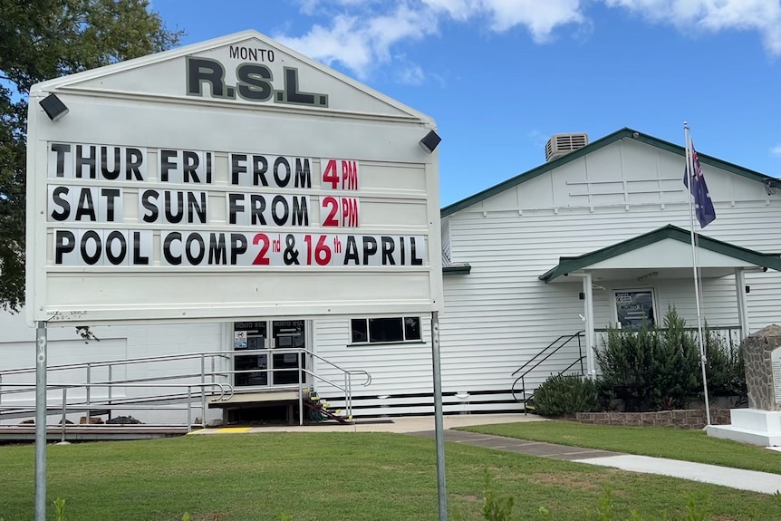 The exterior of a small RSL building with a changable sign out front
