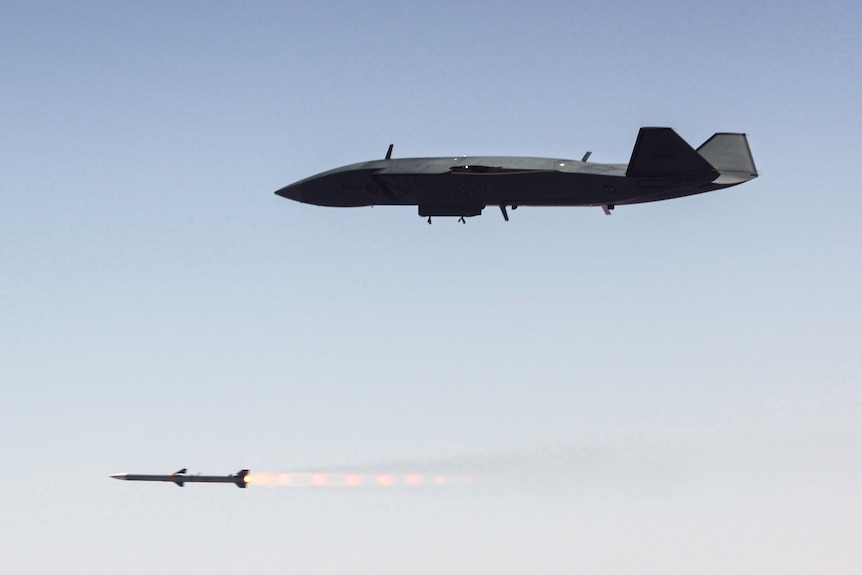 A missile is fired from a drone in flight.