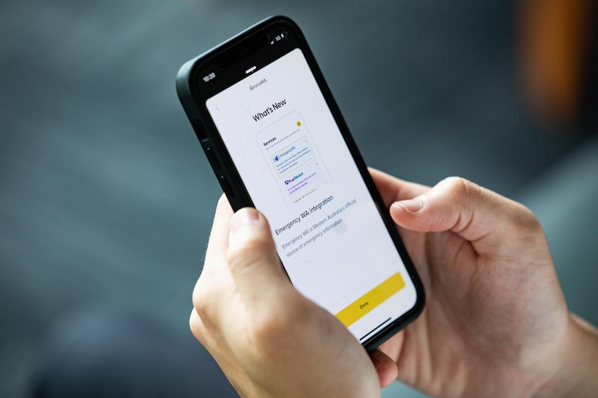 A close-up of someone using a mobile phone.