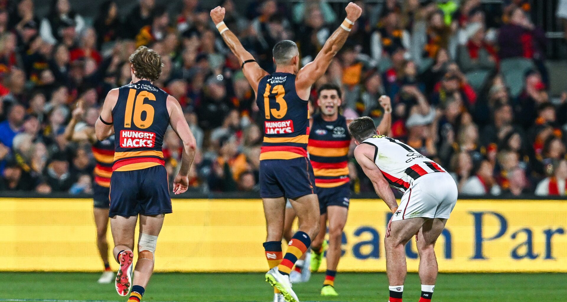 Crows hold on for sensational, emotional win over Saints