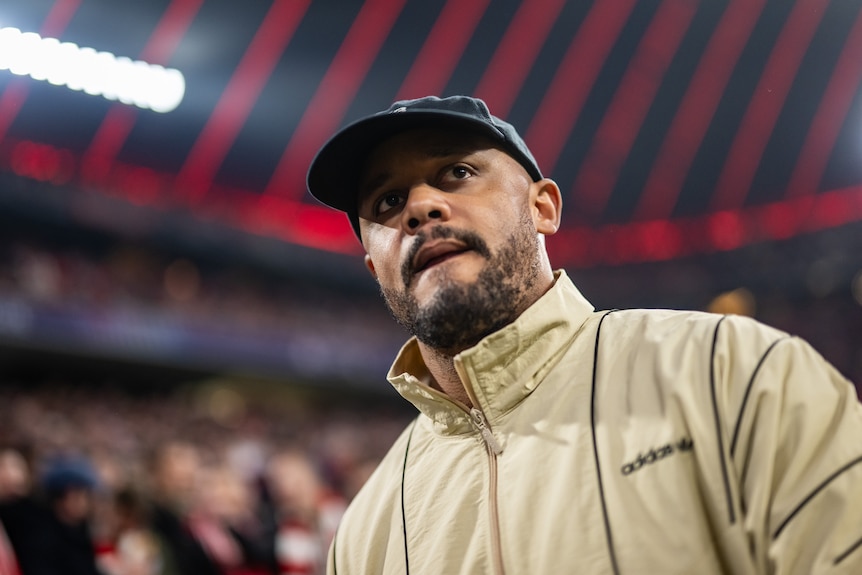 Vincent Kompany looks to one side