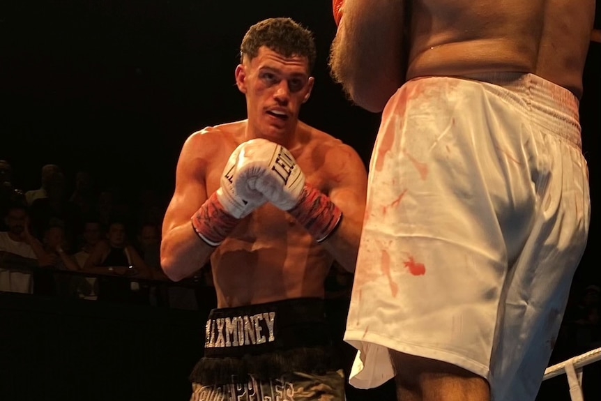 Max McIntyre next to blood-stained shorts