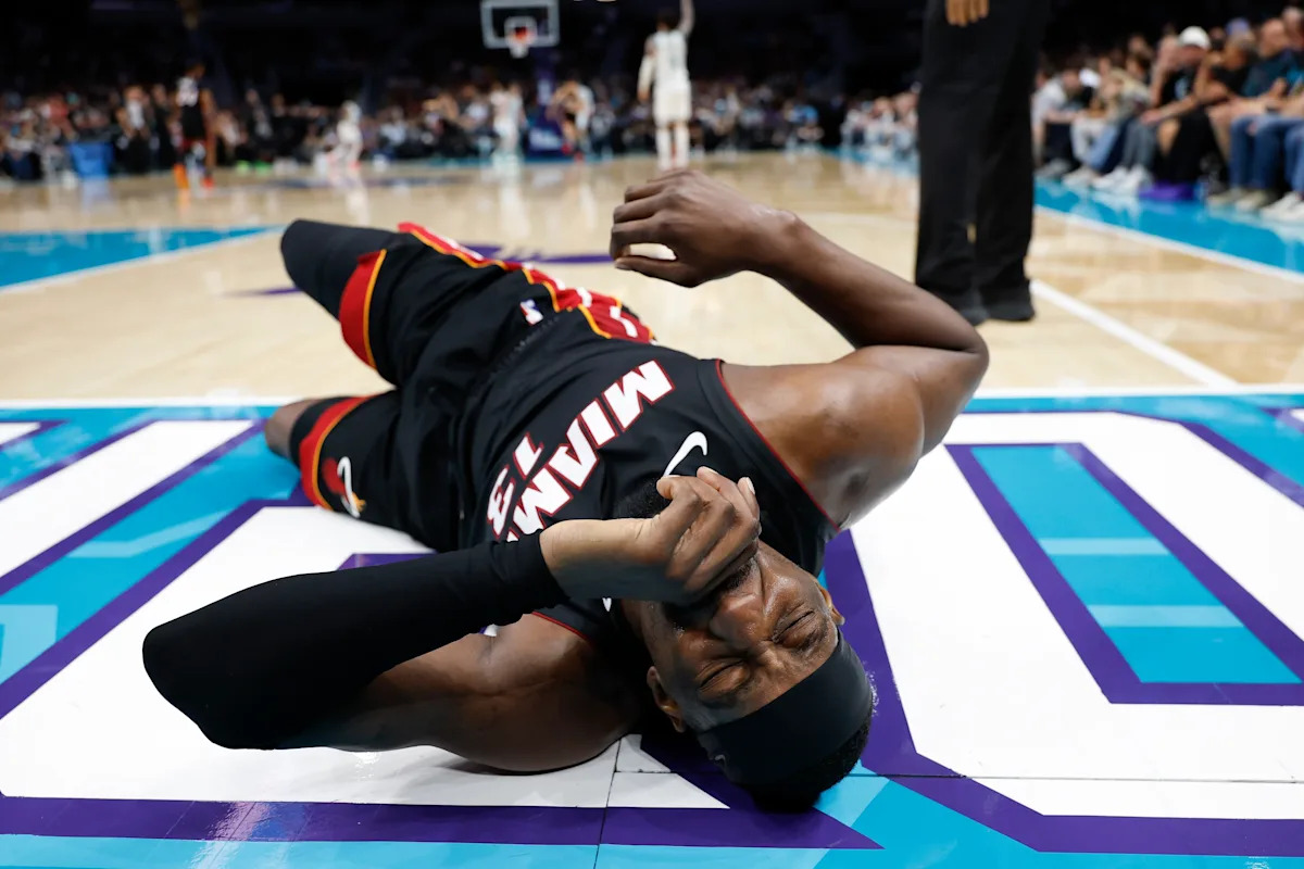 NBA play-in: Heat upset LaMelo Ball wasn't ejected for tripping Bam Adebayo on 'dangerous' play that knocked Miami center out of game