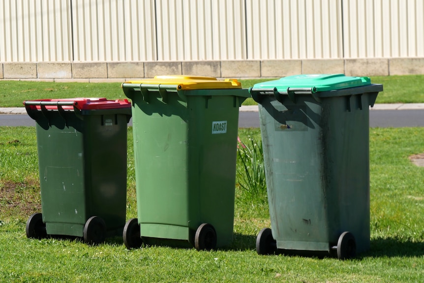 A red, yellow and green bin.