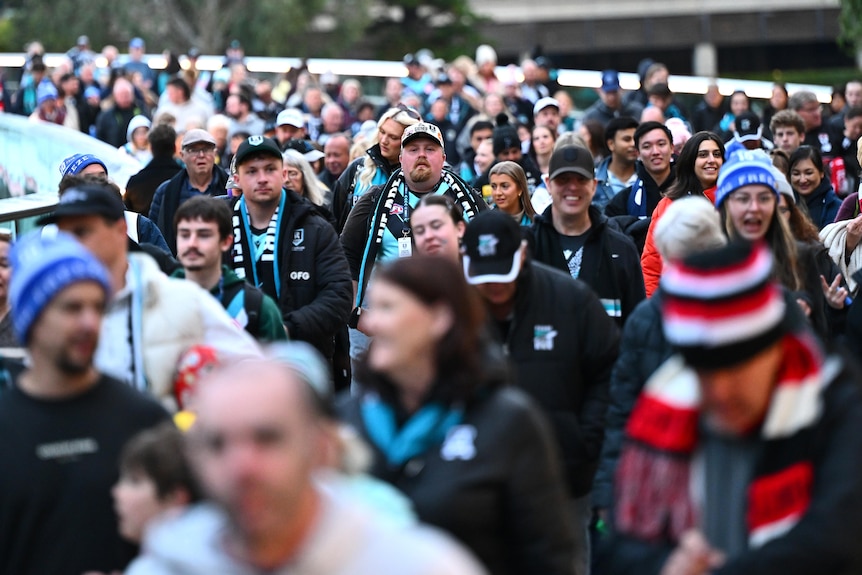 Spectators arrive for the Power vs Saints AFL match during Gather Round.