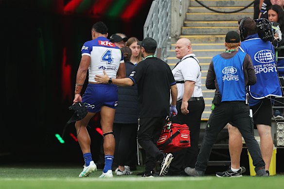 Stephen Crichton leaves the field injured.