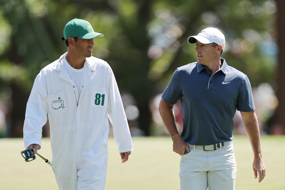 Rory McIlroy of Northern Ireland and caddie Harry Diamond walk to the fourth hole during the final round of the 2025 Masters Tournament at Augusta National