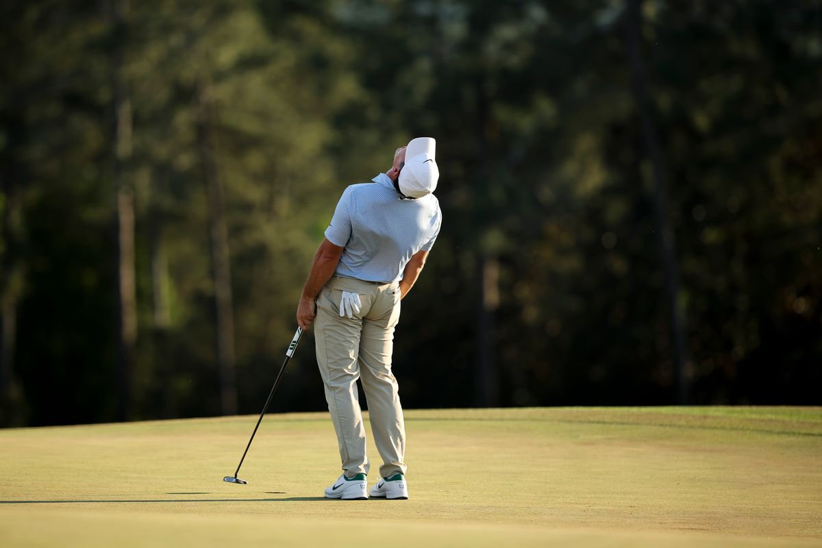 Rory McIlroy of Northern Ireland celebrates winning the 2026 Masters Tournament on the 18th green at Augusta National Golf Club