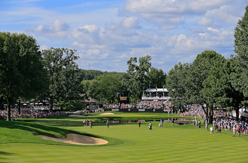 A general view of the 16th fairway and green as Tiger Woods prepares to hit during the Final Round of the World Golf Championships-Bridgestone Invitational at Firestone Country Club South Course on August 4, 2013 in Akron, Ohio.