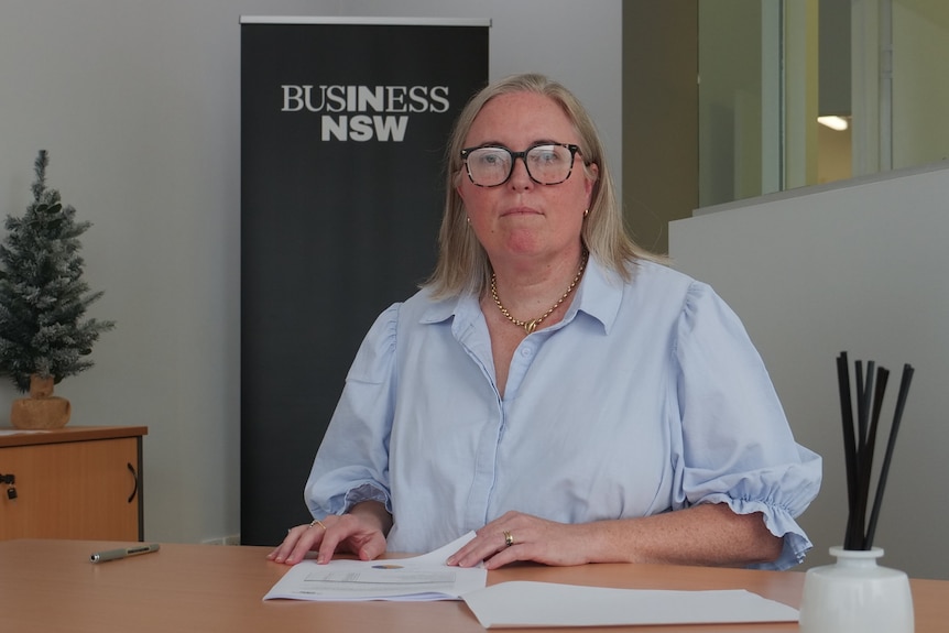 Vicki Seccombe sitting at a table