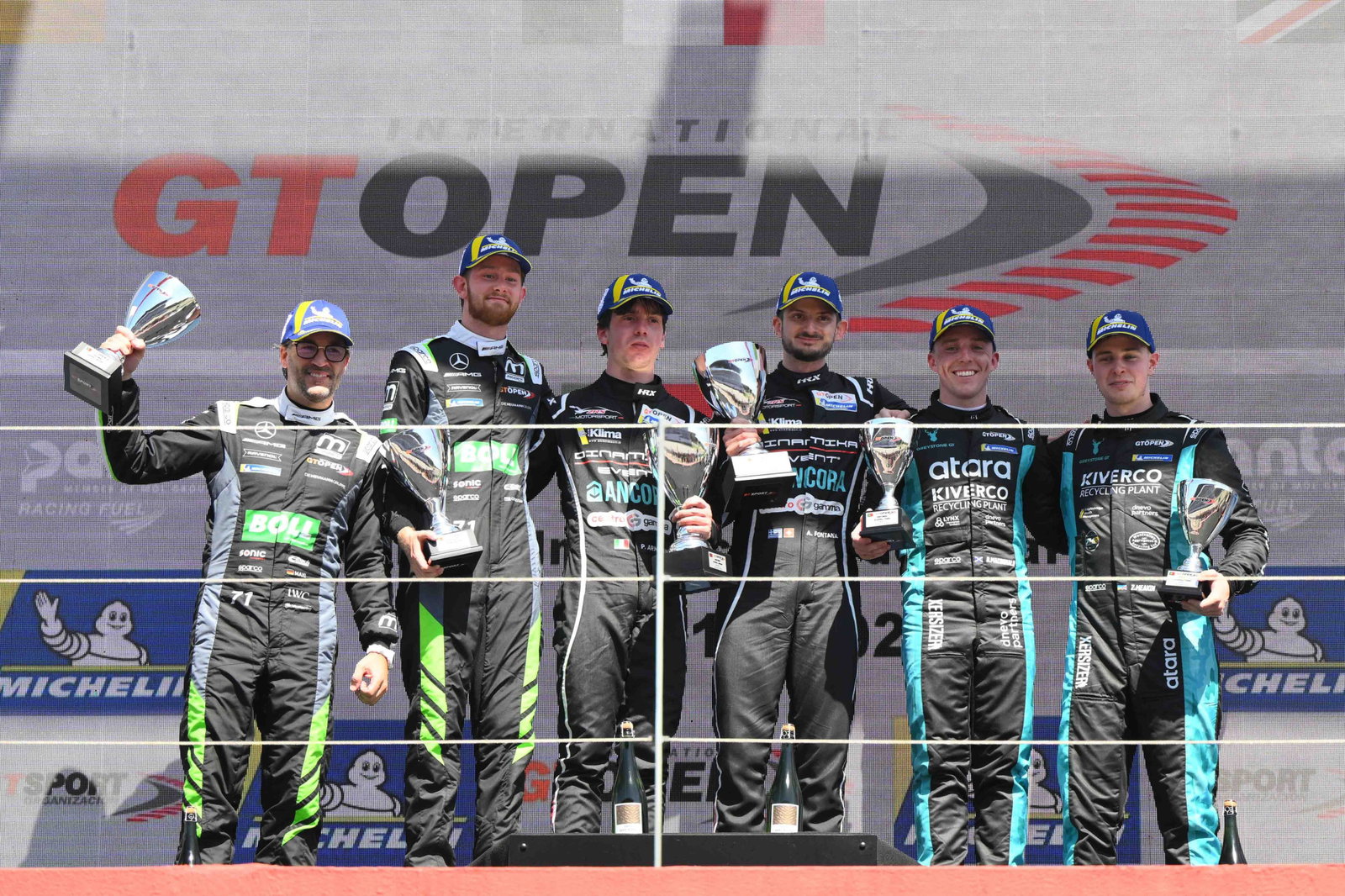 Christian Mansell (second from left) on the International GT Open podium at Portimao.