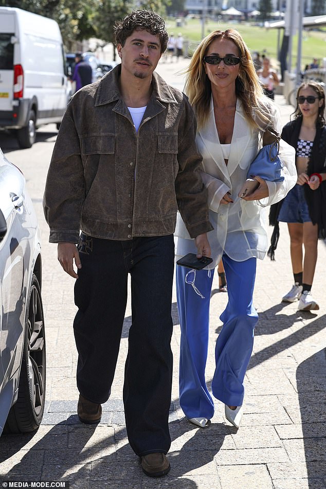 Pip Edwards celebrated Biolae, an Australian brand specialising in supplements for perimenopause and menopause , where she is also an investor, at Iceberg in Bondi Beach on Tuesday. Pictured with  her son Justice