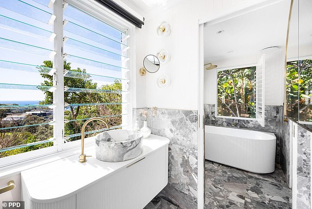 Pictured: One of four bathrooms