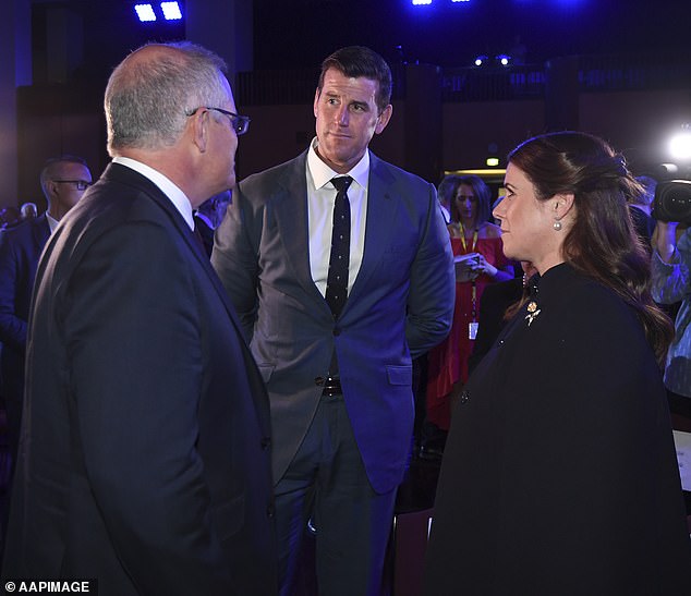 Ben Roberts-Smith with his then wife Emma meet former prime minister Scott Morrison in 2018 at the Australian War Memorial in Canberra