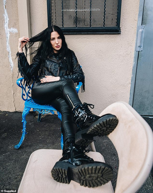 Dorothy Martin, 39, the lead singer of the rock band Dorothy, claims she was once trapped in a partnership with a 'sadistic' world-renowned musician from another popular band