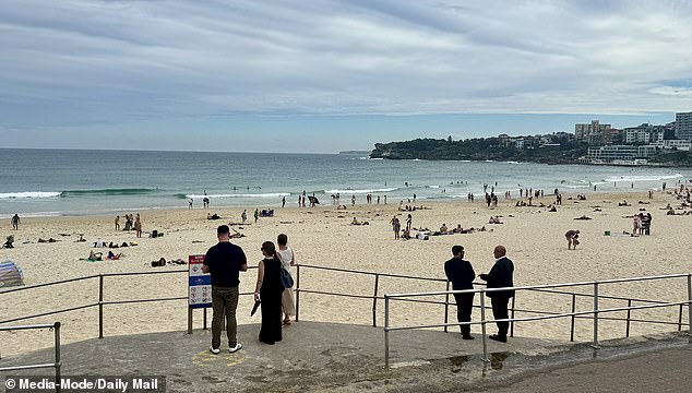 Team Sussex – flanked by plainclothes police – enjoyed the view of the iconic beach