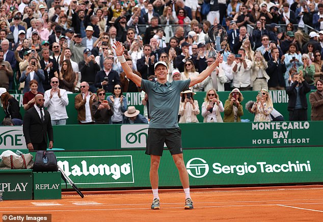 The phone-free scenes in Georgia stand in contrast with scores of fans taking photos and videos on their phones as Jannik Sinner won the 2026 Monte Carlo Masters (pictured)