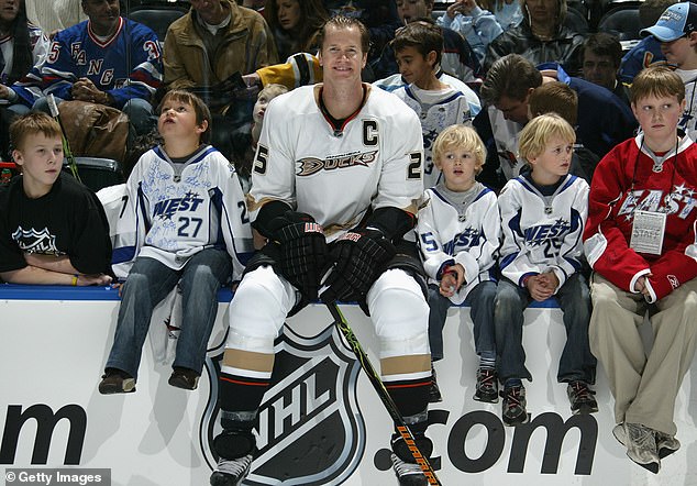 Pronger is seen in Anaheim with his two sons (second and third from right) when he was playing for the Ducks