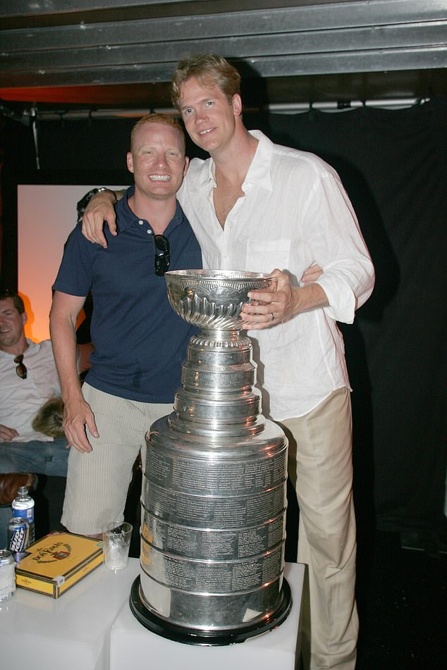 Chris Pronger is seen with his friend, Herbie, after winning the Stanley Cup in 2007